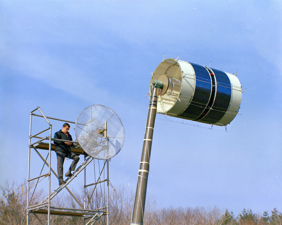 LES-5 undergoes testing at the Antenna Test Range with a researcher looking on