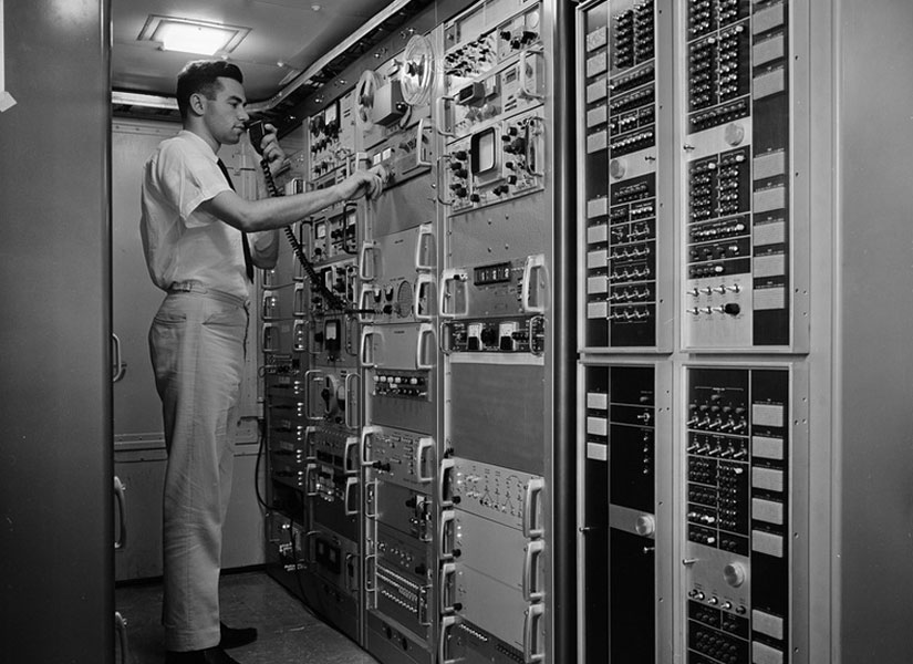 An operator controls the terminal equipment racks